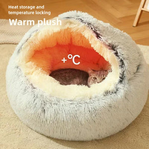 Fluffy pet bed with a cat inside