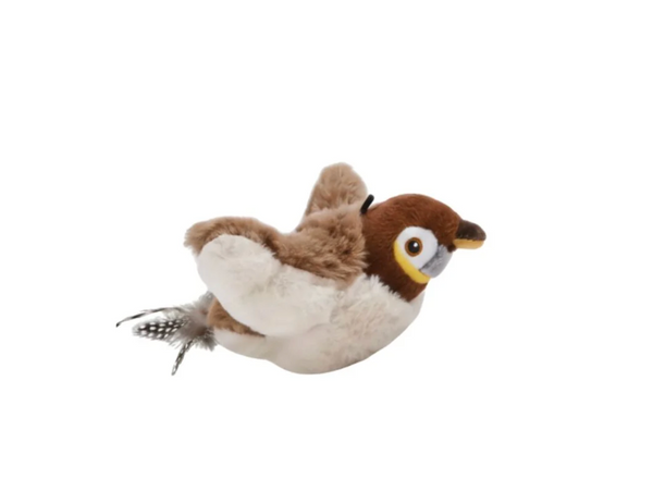 A small plush bird toy with brown and white feathers, a yellow eye ring, and a dark beak, shown against a plain white background.