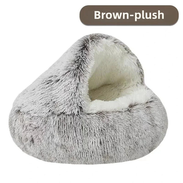 Gray plush pet bed with white interior on a white background
